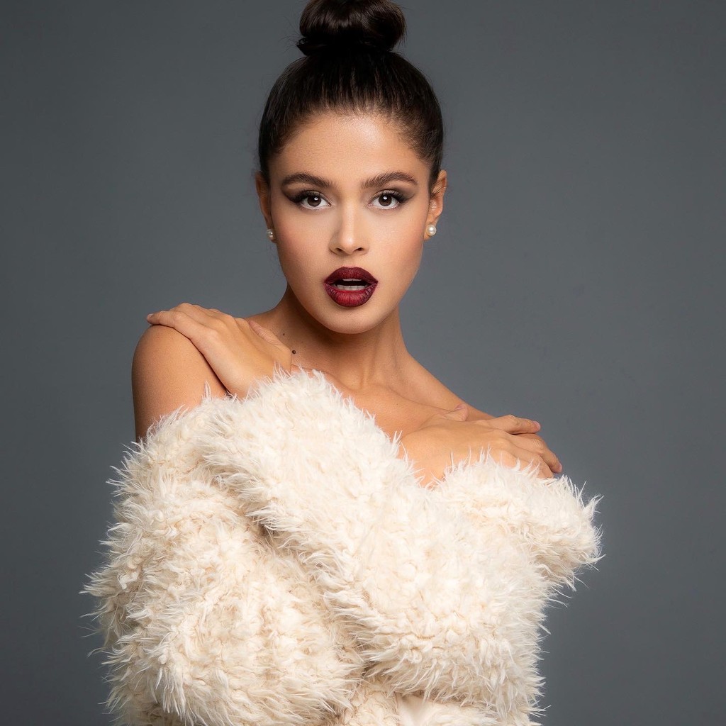 CECILIA T.